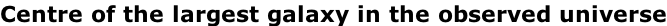 Centre of the largest galaxy in the observed universe
